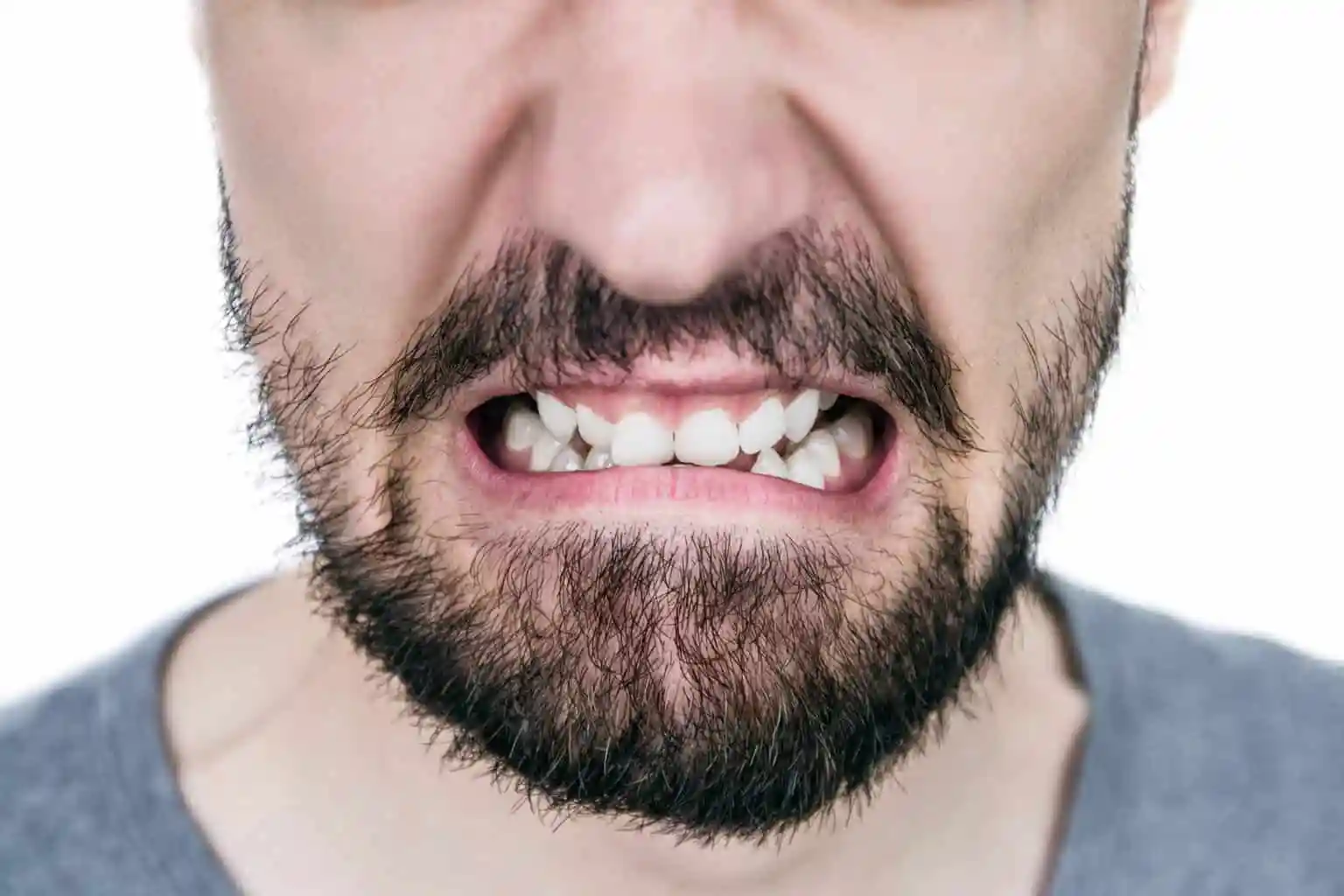 Jaw muscles tensing during teeth clenching (bruxism)