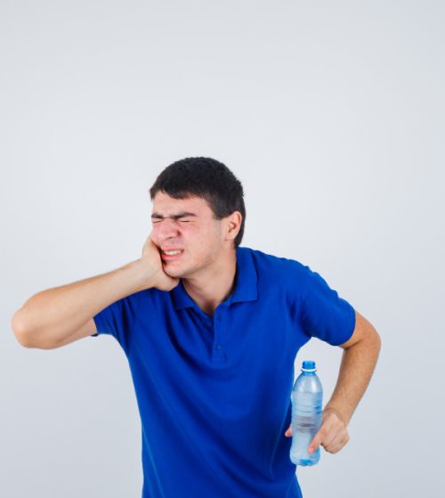 Sensitive tooth stinging from a cold drink